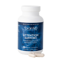 BrainMD Attention Support: supplement bottle with sample capsules in front of a transparent background