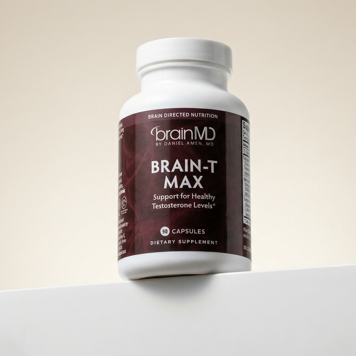 Supplement bottle labeled 'Brain-T Max' by brainMD on a light background