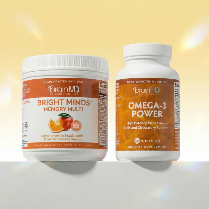 Two supplement bottles from BrainMD on a light yellow background - Bright Minds Memory Multivitamin and Omega-3 Power