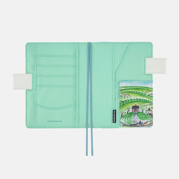 Hobonichi 2026 A6 Planner Cover: Virginia Lee Burton - The Little House, shown with its details.