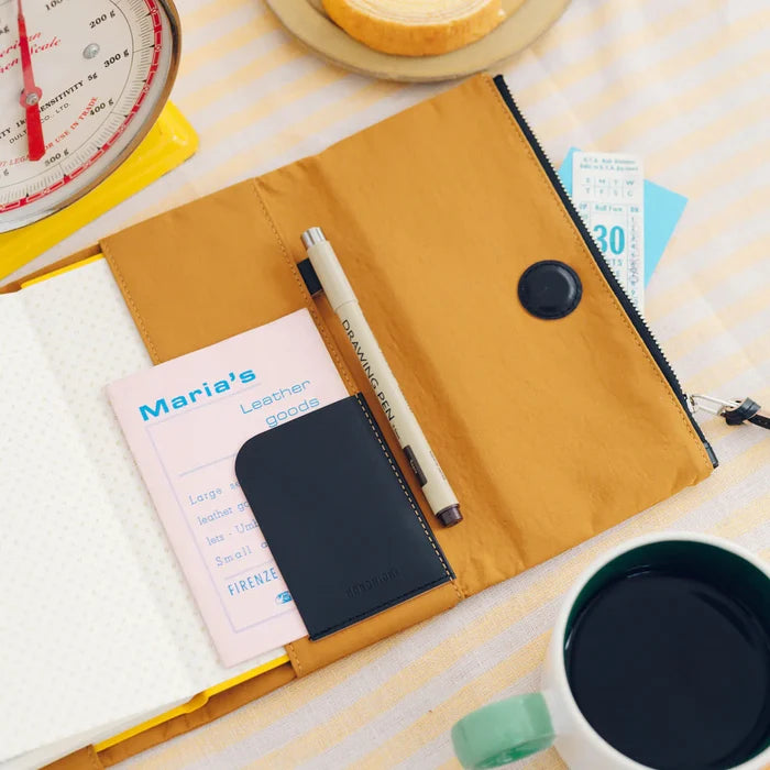 Hobonichi 2026 Weeks Planner Cover: Tragen - Mustard, close-up view.