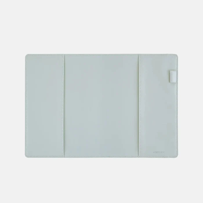 The inside of the cover, the same pale blue throughout with folding flaps