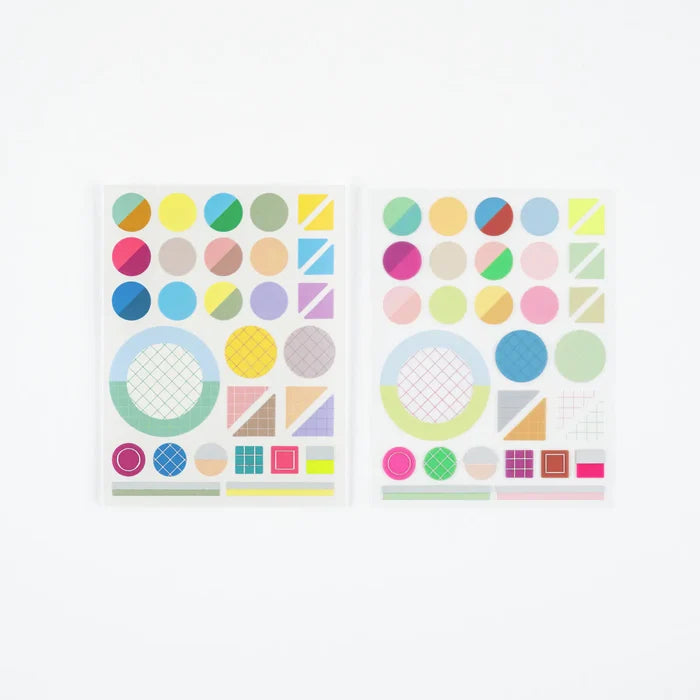 The two sheets side by side, showing the full run of dots, rings and colour blocks