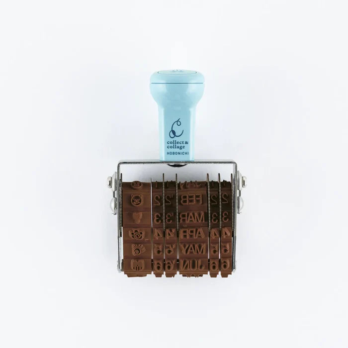 Collect & Collage Daily Memories Rotating Stamp: the stamp itself, brown rubber date wheels held in a metal frame beneath a pale blue knob
