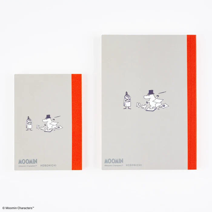 The two sizes shown together again, orange spine tape running down each cover