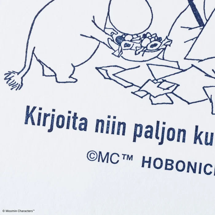 A close-up of the printed design, Moomin characters among scattered papers
