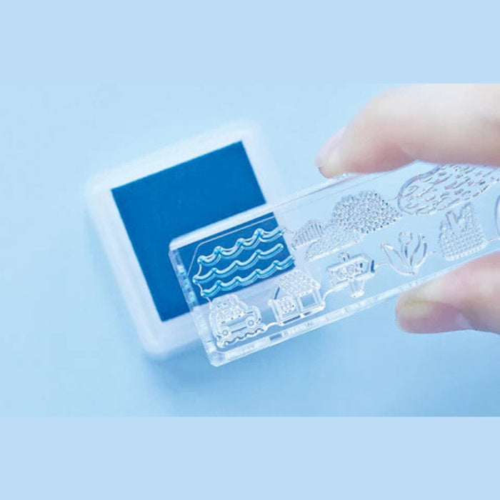Kori Jirushi Lake Blue stamp pad showing stamp design.
