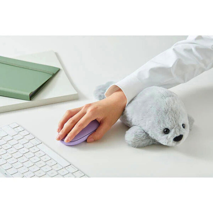 Pouzoo animal design cushion pouch used as a soft wrist rest while working.