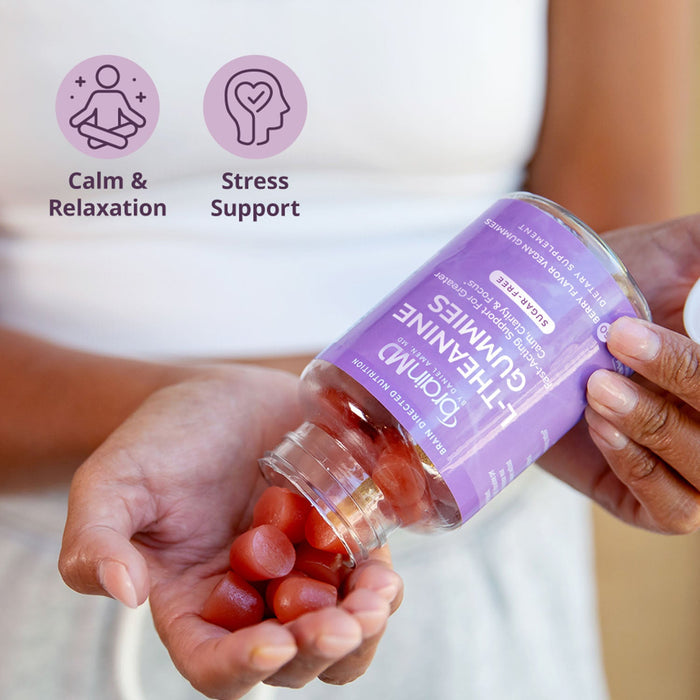 BrainMD L-Theanine Gummies: woman pouring gummies from a purple supplement bottle into her hand, benefits icons inset