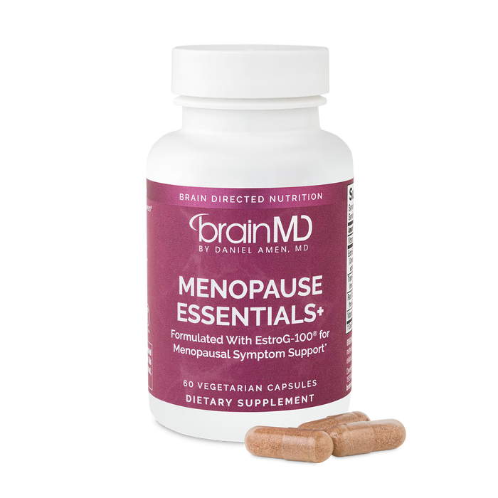 BrainMD Menopause Essentials+: purple supplement bottle with capsules at the base against a transparent background
