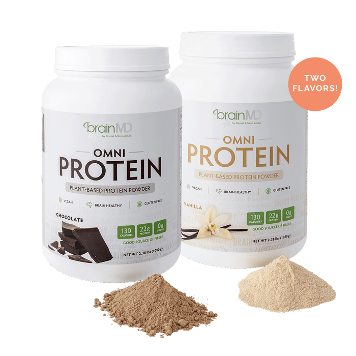 Chocolate and Vanilla flavored protein powder tubs with mounds of powder against a transparent background.
