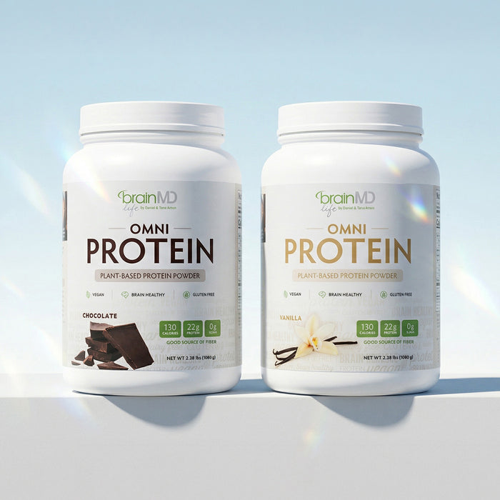 Chocolate and Vanilla flavored protein powder tubs against a powder blue background.