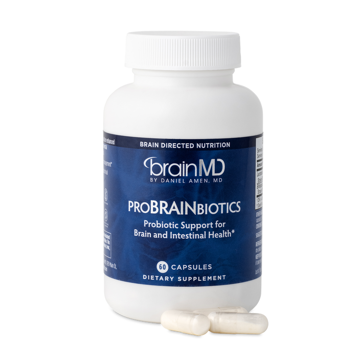 BrainMD ProBrainBiotics: blue supplement bottle with capsules against a transparent background