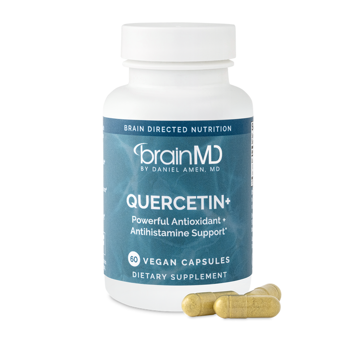 BrainMD Quercetin+: image of blue bottle and three yellow capsules at its base with transparent background