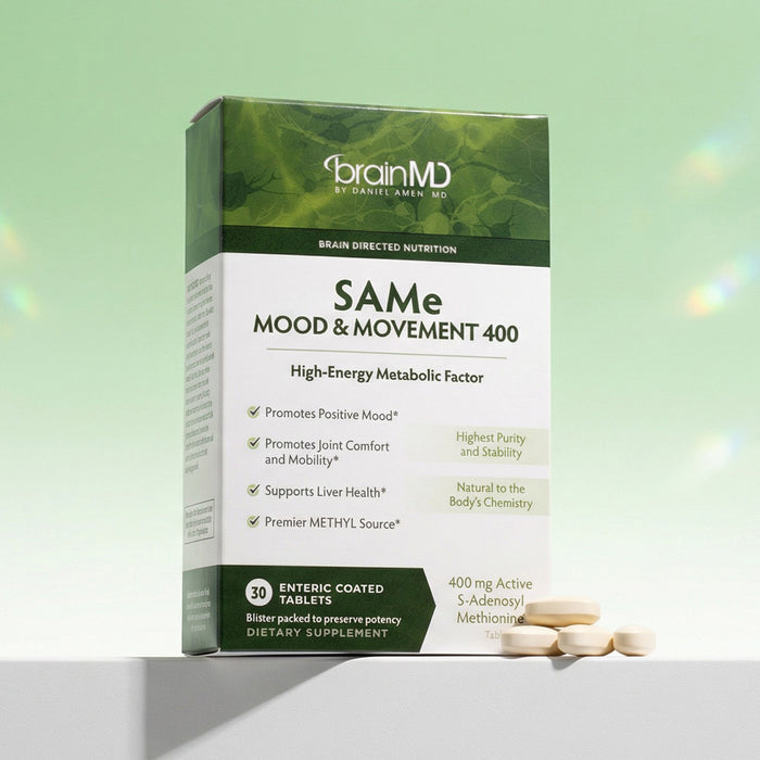 Green supplement box with tablets at the base against a mint green background.