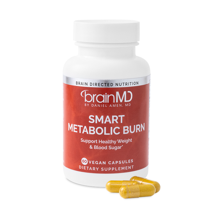 BrainMD Smart Metabolic Burn: red supplement bottle with capsules at the base against a transparent background