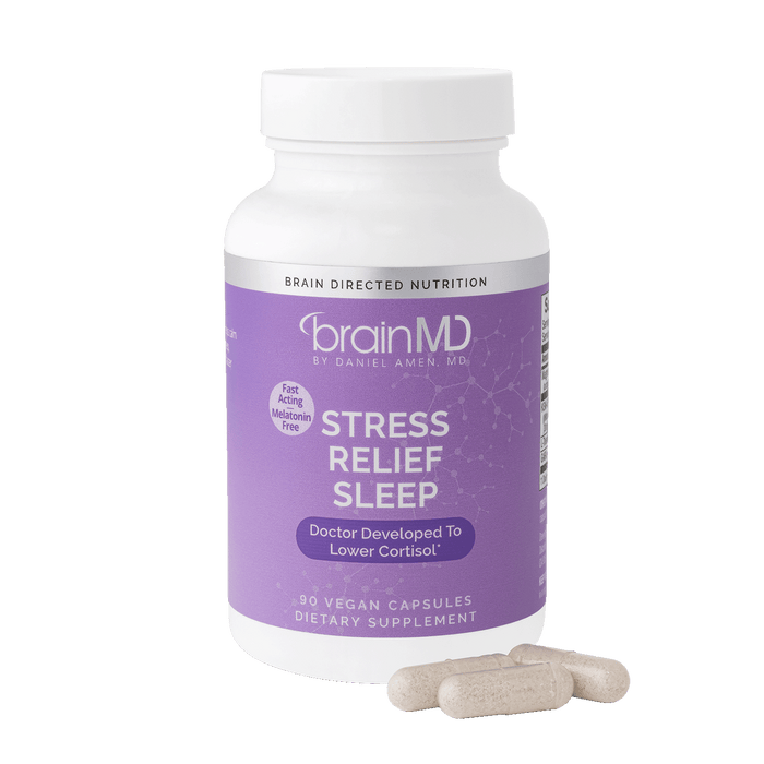 Lavendar supplement bottle with white capsules at the base against a transparent background.