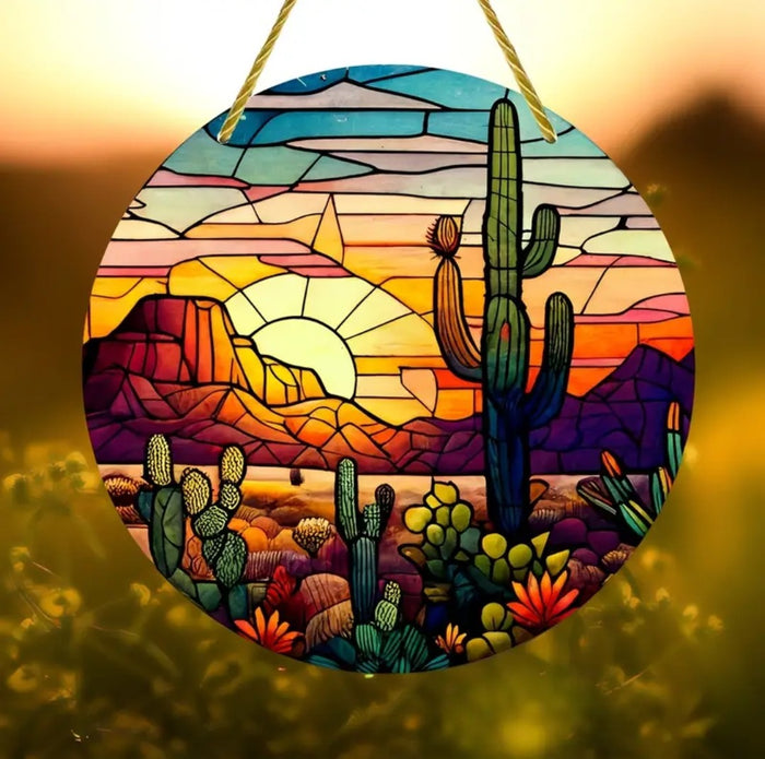 Sunset Cactus Suncatcher with desert scene and cacti.