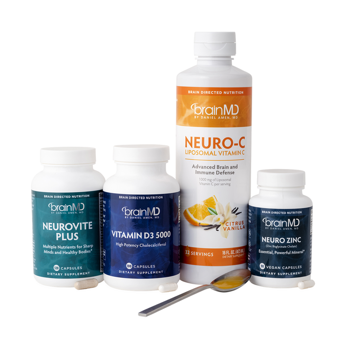 BrainMD Total Immune Health Bundle: 4 supplement bottles in various sizes and colors against a transparent background