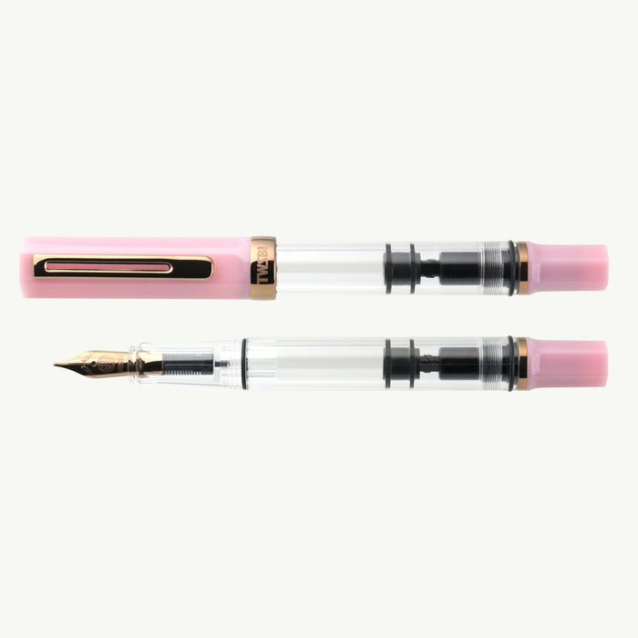 TWSBI ECO Pink Lemonade fountain pen shown capped and uncapped, with bronze trim and clear barrel.