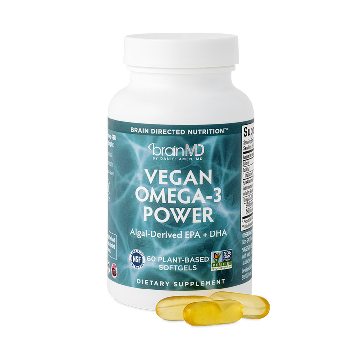 BrainMD Vegan Omega-3 Power: green supplement bottle with golden softgels against a transparent background