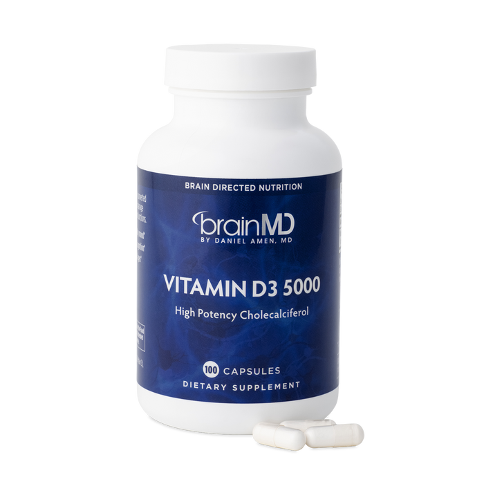 BrainMD Vitamin D3 5000: image of a purple supplement bottle against a transparent background